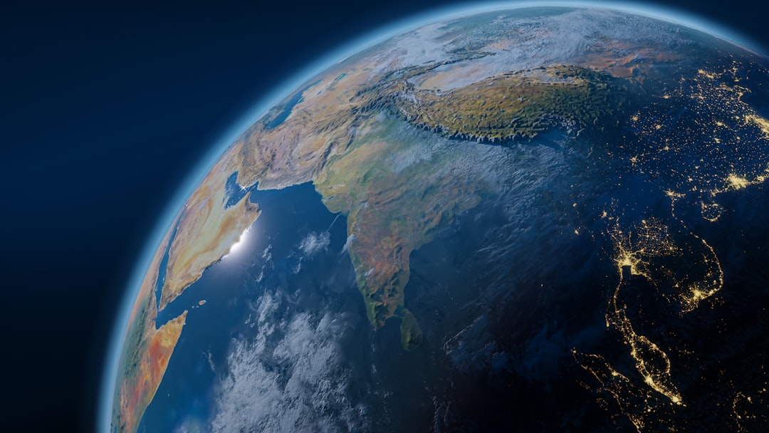 A dynamic image merging a detailed close-up of layered geological strata in the foreground with a softly glowing, semi-transparent global map of Earth in the background, subtly indicating research points.