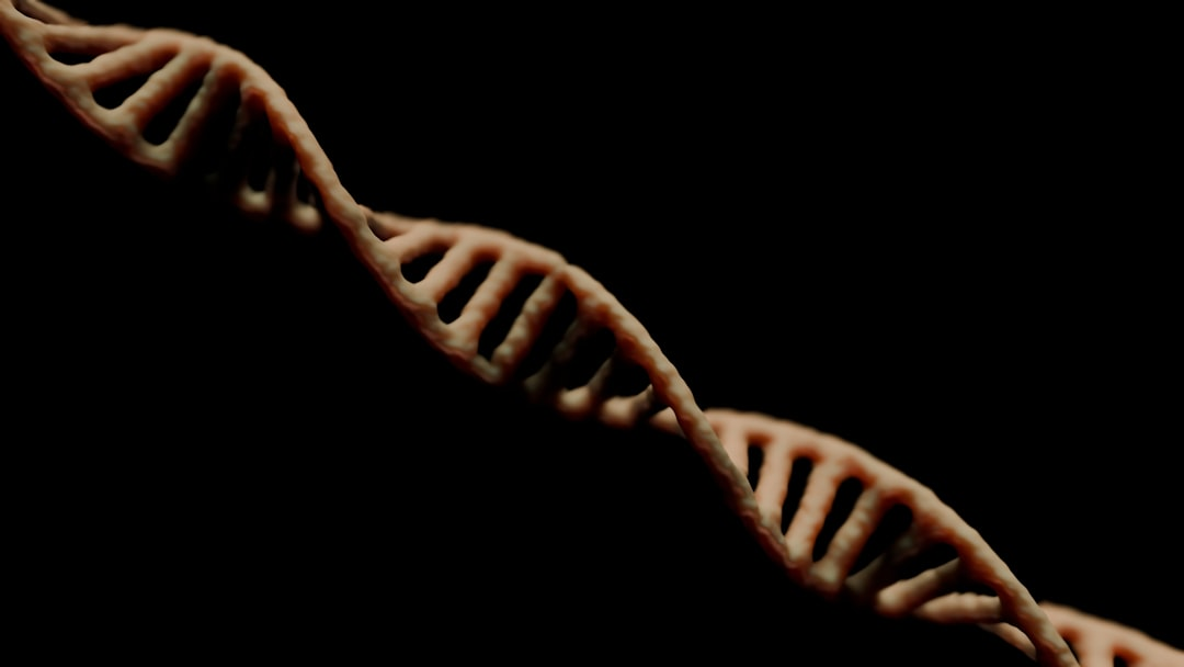 A luminous, intricately detailed DNA double helix, composed of glowing light and interwoven with subtle digital code, spirals upwards from a dark, swirling cosmic nebula, hinting at the origins of life and its decoded secrets.