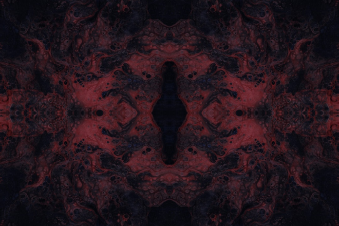 A dark, symmetrical abstract pattern in deep reds and blacks with fluid, organic textures, evoking the mysterious depths of the subconscious and dream states.