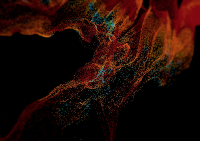 Vibrant orange and red particles with hints of blue swirl in dynamic patterns against a black background, illustrating the complex interplay of forces in quantum and gravitational theories.